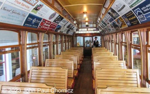 After hopping aboard, you can see how Streetcar #: 23 looks after being refurbished to modern standards. Believe it or not, the streetcar is a New Jersey native and was built in 1906, in Elizabeth, NJ by the Stephenson Car Company. It was initially built to run on the Forest Line in Cleveland, OH and was open-sided. In 1924, the City of Nelson purchased the car and operated it, with two other streetcars, until 1949 when operations were taken over by buses. In the background, you can see the other member of the crew, "Joe", who will be serving as the conductor on this trip.