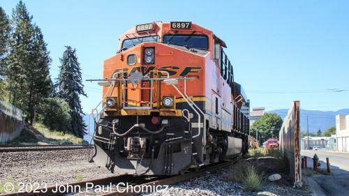 After a few days up in Canada, I was back in the U.S., Idaho to be exact. One stop was in Bonner's Ferry, ID where I caught BNSF #: 6897 sitting in the yard. It seems to have just pulled in with a wide dimensional train of crew quarter cars and it still has the brackets for the flags.