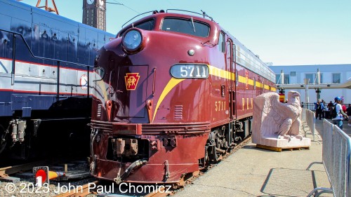 On October 1st, 2023, NJT held a "Meet the Heritage Fleet" day to celebrate the 40th anniversary of the railroad. The event was held at Hoboken Terminal and featured a display of the locomotives that were painted in the liveries of the original railroads from which New Jersey Transit was derived, as well as some visitors. One visitor was this privately owned E8 that was restored back to its original Pennsylvania Railroad colors. It was built in 1952 for the Pennsylvania and served until it was absorbed by Conrail. It was then used by NJ DOT/NJT on commuter services before the type was retired in 1987. In the background, you can see a replica of an eagle statue that was part of the original Pennsylvania Station in New York City. The originals were destroyed during the demolition of the station.