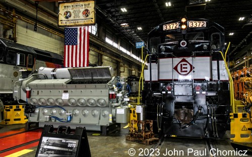 Along with the heritage units on display, outside, there were numerous displays inside the shops, as well. One of the highlights was the Erie Lackawanna U34CH #: 3372 built in 1971 for the Erie Lackawanna Railroad. It ran on New Jersey Transit's Hoboken Division trains before the type was retired in the 1990's. Here, it is displayed alongside an engine of current locomotive, as well as an F40 and some other locomotive components that are out of the picture.