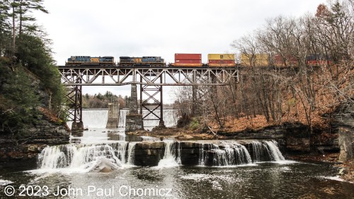 About an hour after the Southern unit appeared, the next train was an eastbound stacktrain. The CSX units and the bright containers add a bit of warmth and color to an otherwise dismal and cold day here in Guilderland, NY.