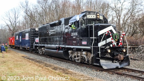 The engineer shoves his head out to make sure the train is clear before departing Port Murray, NJ. The next stop is Washington, NJ and the short train led by DRRV GP38-2 #: 2006.