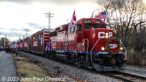 On Black Friday, the CP Holiday Train made its appearance in the New York Capital Region just north of Albany. Since this has always been on my to-do list and never went after it when CP still owned the D&H north of Scranton, I figured this would be the closest it would get to where I live so I went for it. Here it is arriving at Menands, NY the first stop of the day. Although it is lit, the daylight entrance doesn't allow one to fully appreciate the beauty of the decorations.