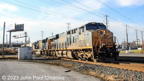 A few minutes after arriving at the west end, distant train horns prompted me to set up for a photo of another eastbound. It surprised me at how fast the train was moving as it passed through Wilsmere Yard in Wilmington, DE. Apparently, it would not stop to work the yard and, after this train, the action would dry up until after dark.