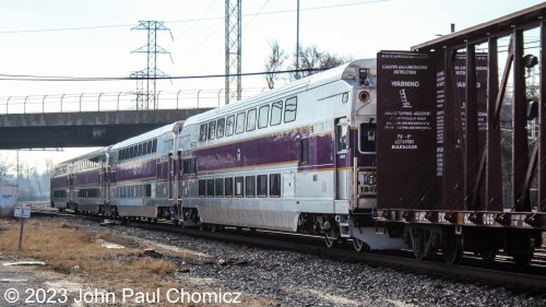 If I wasn't sure of the destination for this train, the four MBTA Multilevels on the end give it away. This M-Train is most likely going to Selkirk, NY to bring these units back home to the Boston, MA area.