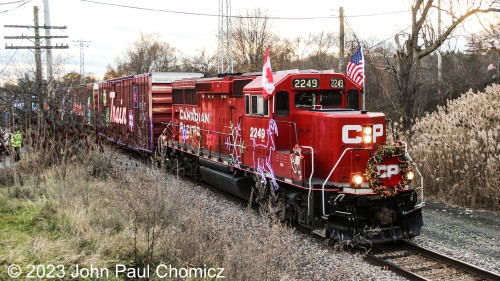 After it arrived, my first thought was to take as many pictures as possible and try not to get the crowds of people that showed up to see it, as well. Here is another photo of the CP Holiday Train in Menands, NY not quite up to its full glory in the daylight.