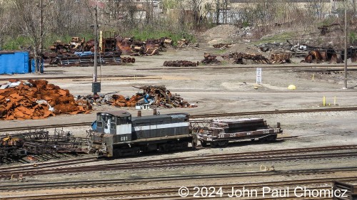 From the same trip as the Flats Industrial Railroad and also an original no-post photo, this is a photo of the Weirton Steel SW1500 #: 681. The photo was taken from the nearby highway and I had to crop the guardrail out of the shot. Here, it sits in the recently closed Weirton Steel Mill Yard in Weirton, West Virginia. This shot was taken in 2007 and I haven't been back since, so I don't know if this operation is still around.