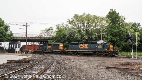 After having a chat with the friendly engineer, I was told that the train wouldn't fit onto one track and he would need to break it down among a few tracks. He also told me that once this was done, he would not be proceeding down to Browns Yard, as I thought he would, but would be returning north to drill Bayway Yard before returning to Oak Island. Here, the train gets the signal to pull out past the signal before shoving back into the yard to split the train up.