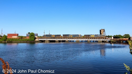 I got there just in time to catch my first train of the day which was this northbound CSX intermodal train. It's crossing Overpeck Creek on a beautiful, sunny, Saturday morning in Ridgefield Park, NJ.