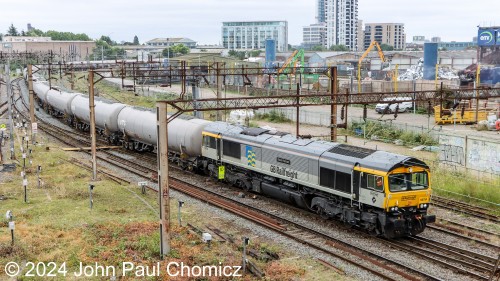 After all the boring passenger stuff, freight is what I came to see. Willesden Junction is a good place to railfan because there is a mix of high-speed passenger and freight traffic. The first sighting is an eastbound unit tank train run by GB Railfreight. It is led by a British Rail Class 66 Diesel.