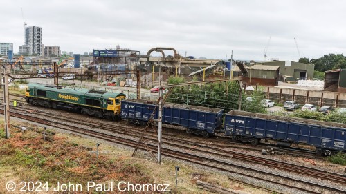 We're in the U.K. so the terminology is a bit different there. I believe the term for, "drilling", is, "shunting". This time, Freightliner British Rail Class 66 pulls a string of gondola cars west out of the small freight yard in Willesden Junction, London, UK.