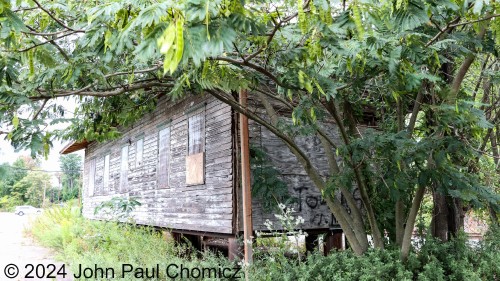 From the front, the station looks relatively intact, however, the overgrown backside of the station appears to be in the worst shape and seems to have the most openings for the natural elements to infiltrate.